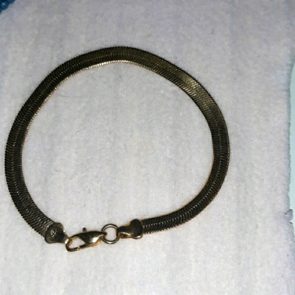 Gold Herringbone Bracelet.